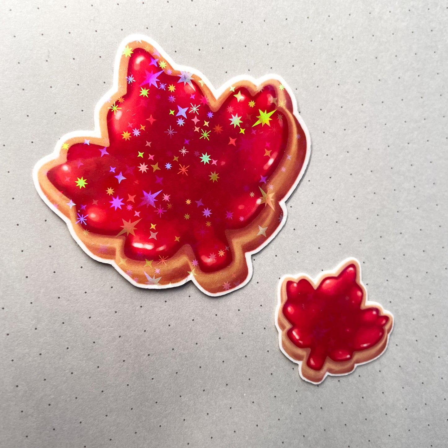 Canadian Maple Leaf Cookie Sticker Set - Jammy biscuits that sparkle and shine! One large and one mini holographic sticker. Made in Canada