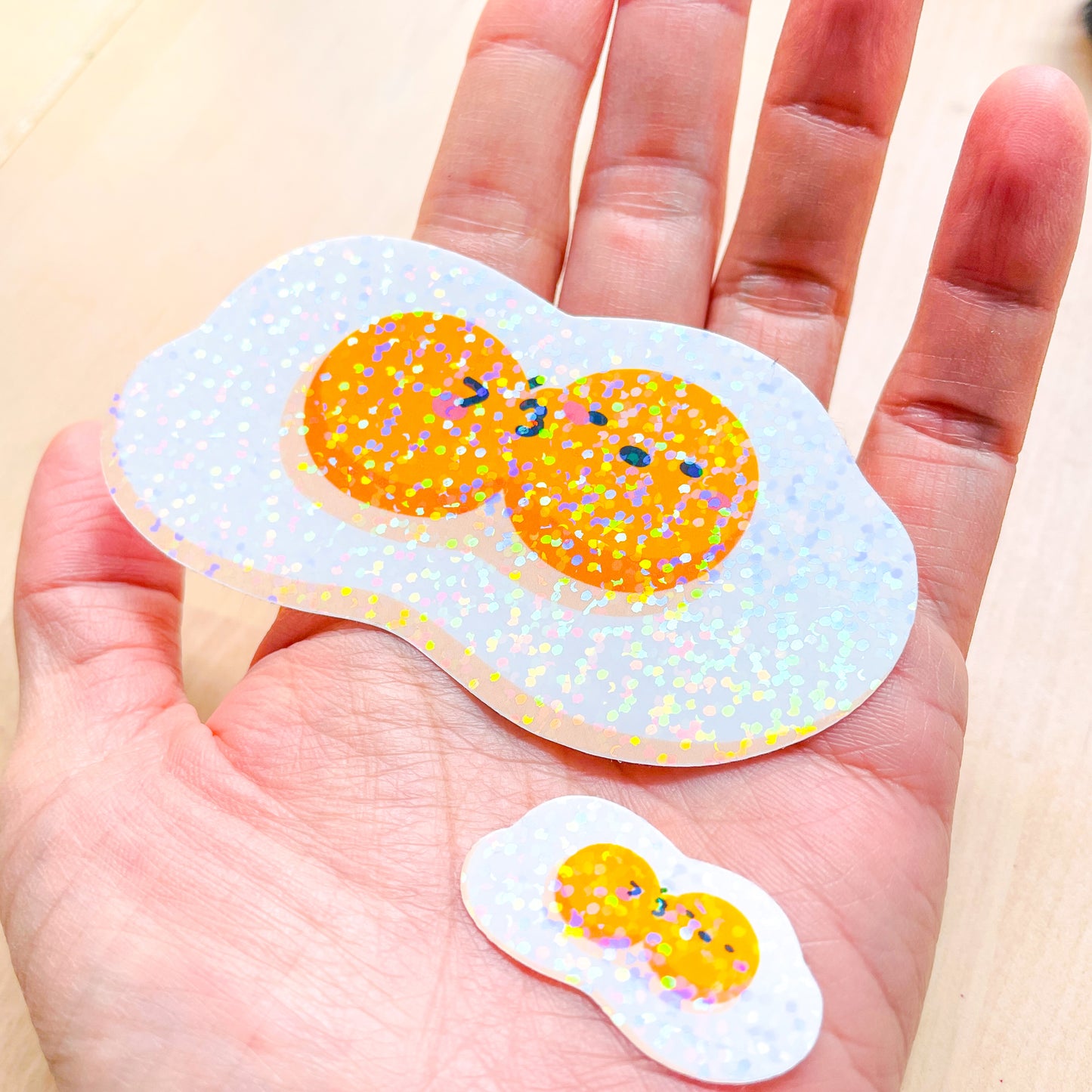 Fried Egg Double Kiss Stickers | Shiny holographic set of one large and one mini glitter sticker. Relationship status: It's complicated!