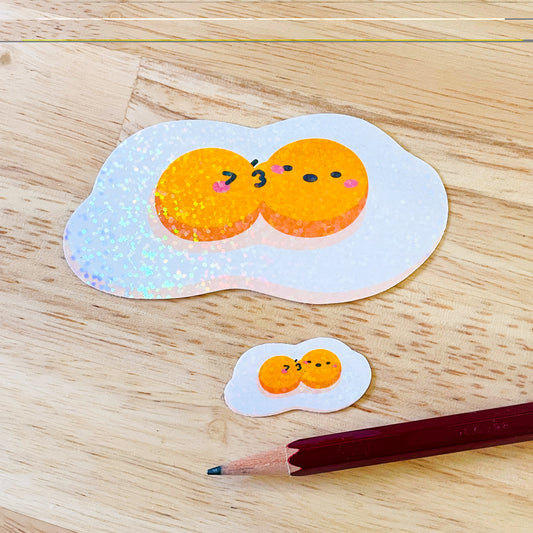 Fried Egg  Double Kiss Stickers | Shiny holographic set of one large and one mini glitter sticker. Relationship status: It's complicated!